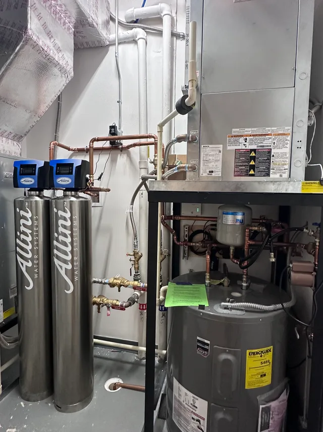 Tier One water heater and mechanical installation with neatly arranged piping