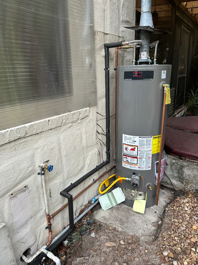 Water heater and connected piping installed by Tier One Plumbing